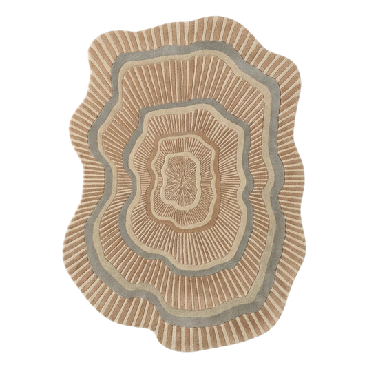 Round beige rug with concentric circle pattern on a white background
