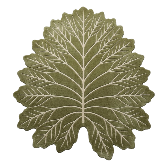 Green leaf-shaped rug on a white background